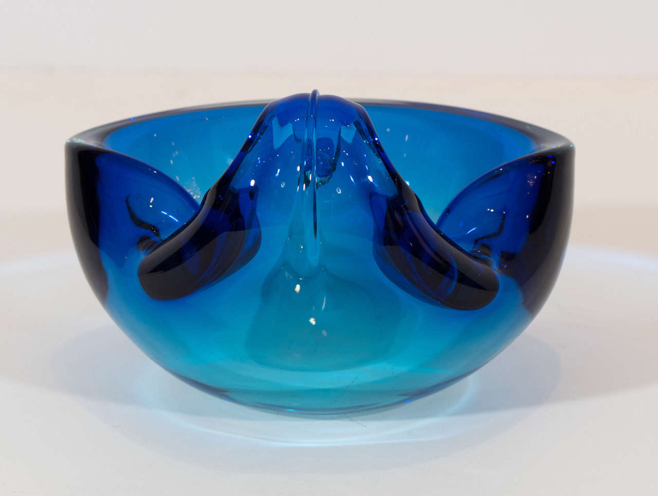 A lovely Murano bowl, beautifully formed in a jewel like color. Please contact for location.