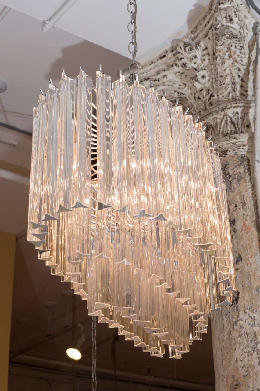 Beautiful multi tiered crystal chandelier. Please contact for location.