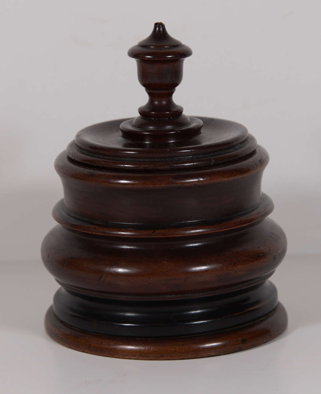 Wooden Dutch tobacco jar circa 1800s. Similar to the English's love for tea, the Dutch admired the product grown in their colonies, tobacco. The English were well known for their beautiful and decorative tea caddies and the Dutch were known for