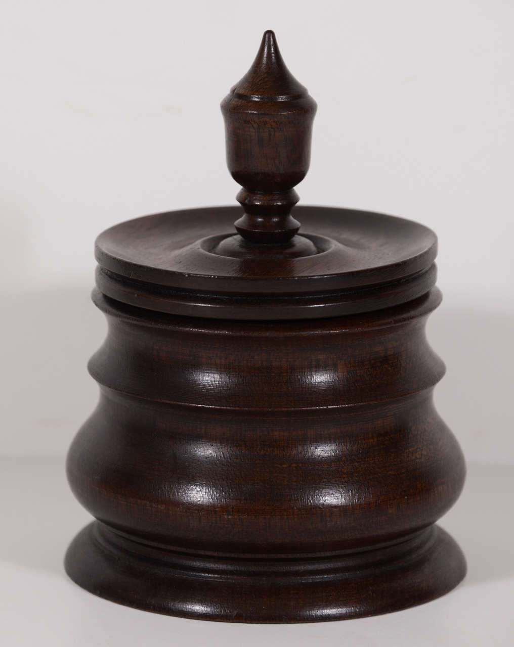 Wooden Dutch tobacco jar circa 1800s.  Similar to the English's love for tea, the Dutch admired the product grown in their colonies, tobacco. The English were well known for their beautiful and decorative tea caddies and the Dutch were known for