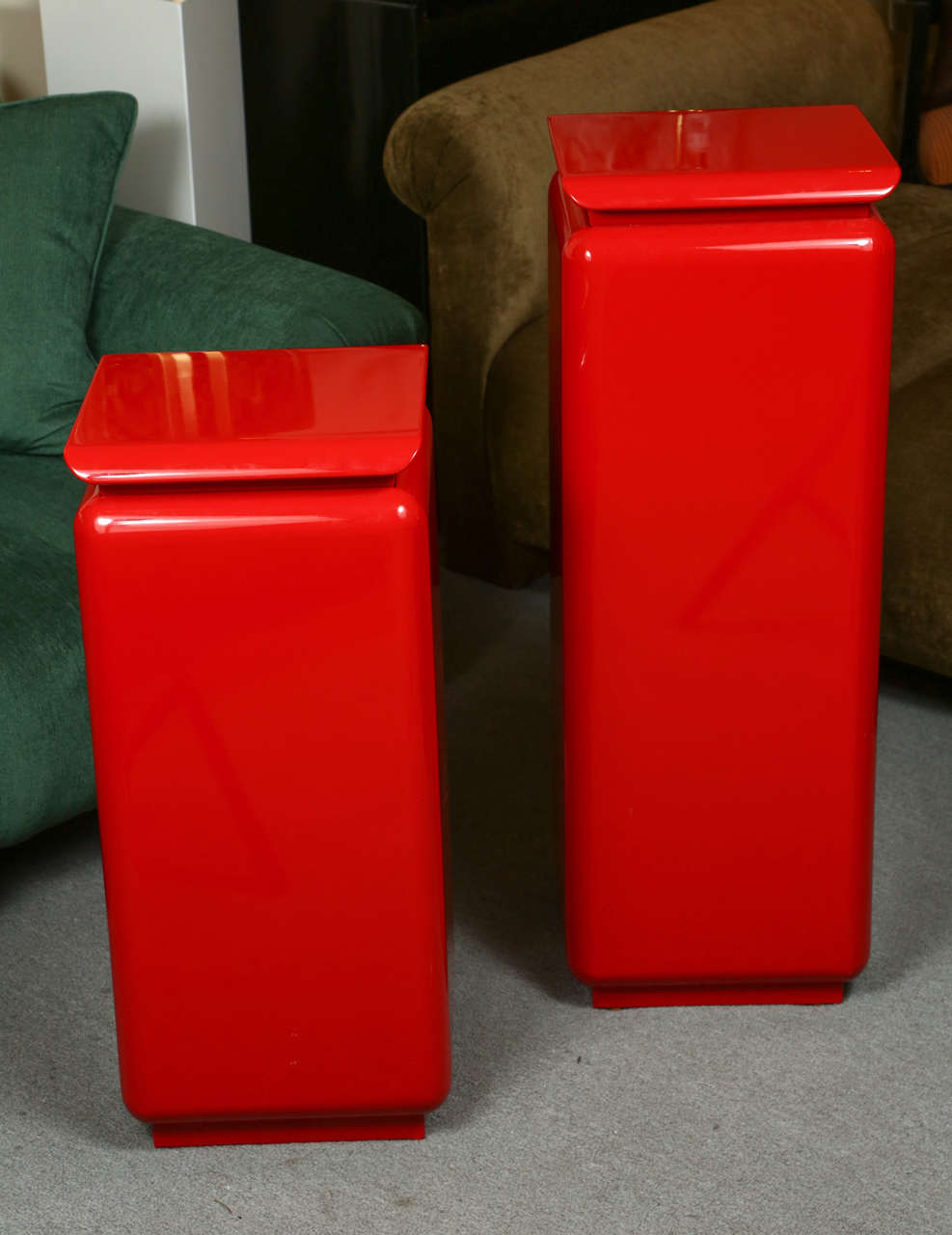 Pair of beautiful pedestals by Rougier.   The glossy lacquered finish is a gorgeous Chinese red. They have the same dimensions except for the height.   
One is 35