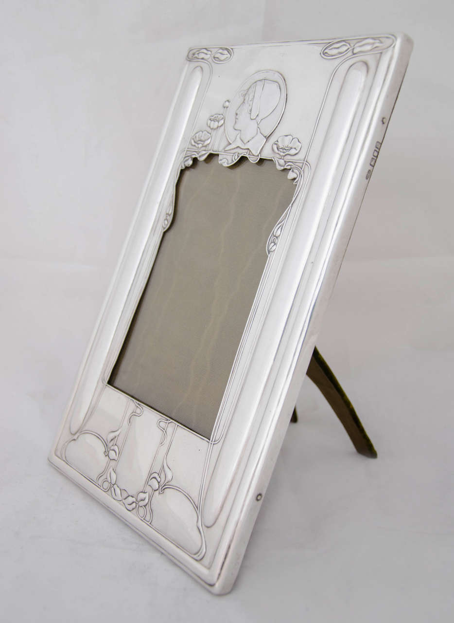 A silver photo frame made in London in 1902 by The Goldsmiths and Silversmiths Company and designed by Kate Harris. This rare and stylish art nouveau frame is a lovely example and would be a beautiful addition to a collector or enthusiast of both