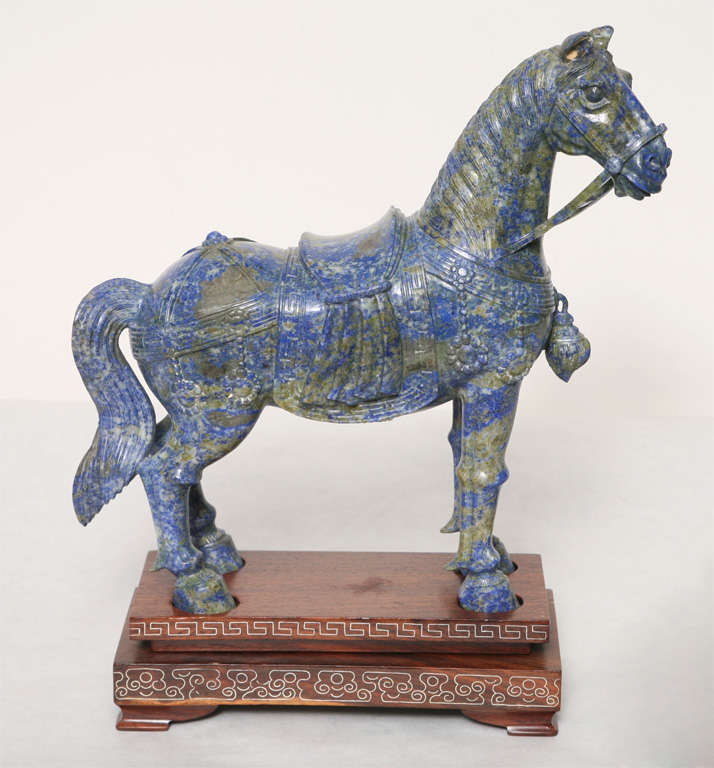 A FIGURE OF A CAPARISONED HORSE. CHINESE, 20th CENTURY