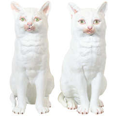 A Pair of Large White Porcelain Cats