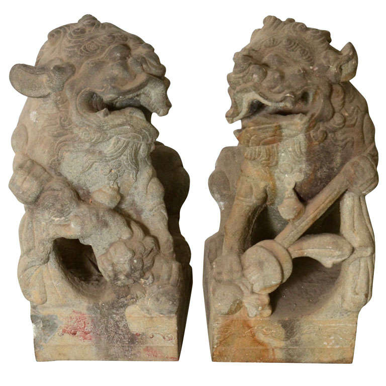 Pair of Late 18th Century Qing Dynasty Peking Carved Limestone Foo Dogs