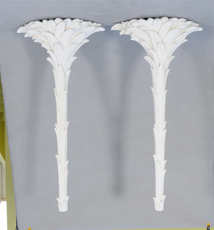 Pair of wall mounting palm tree floor lamps, of painted fiberglass, with palm leaf details.