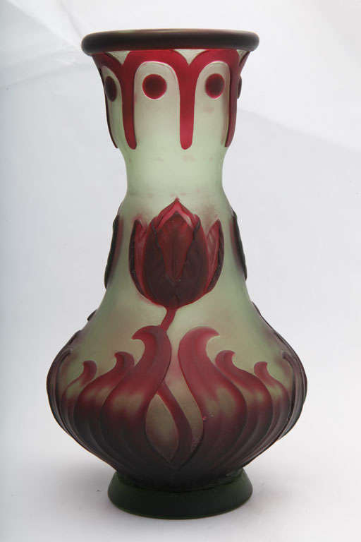 A rare signed Eugene Michel cameo glass vase, red on yellow, carved with tulips, signed E. Michel