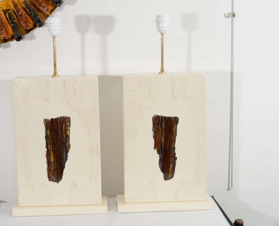 Pair of table lamps in tiger eye incrusted white resin thought to be made during a temporary association of Daro and Hertched.