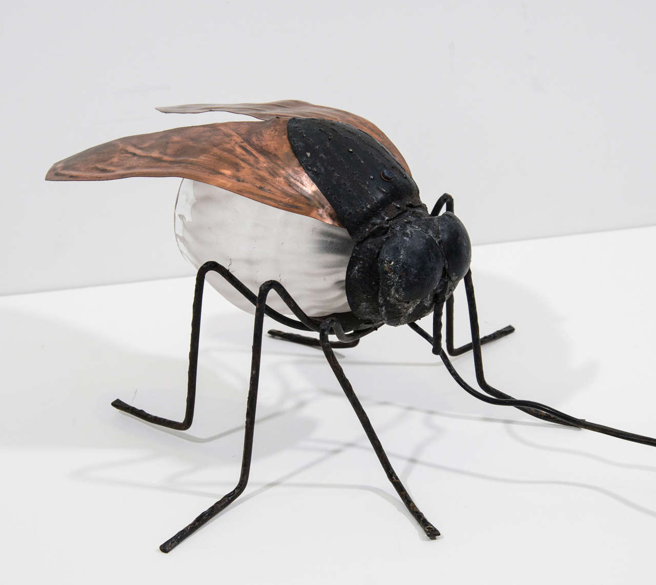 This little bugger can be used as a table lamp or mounted on a wall. This is one fantastic fly that you won't want to swat!