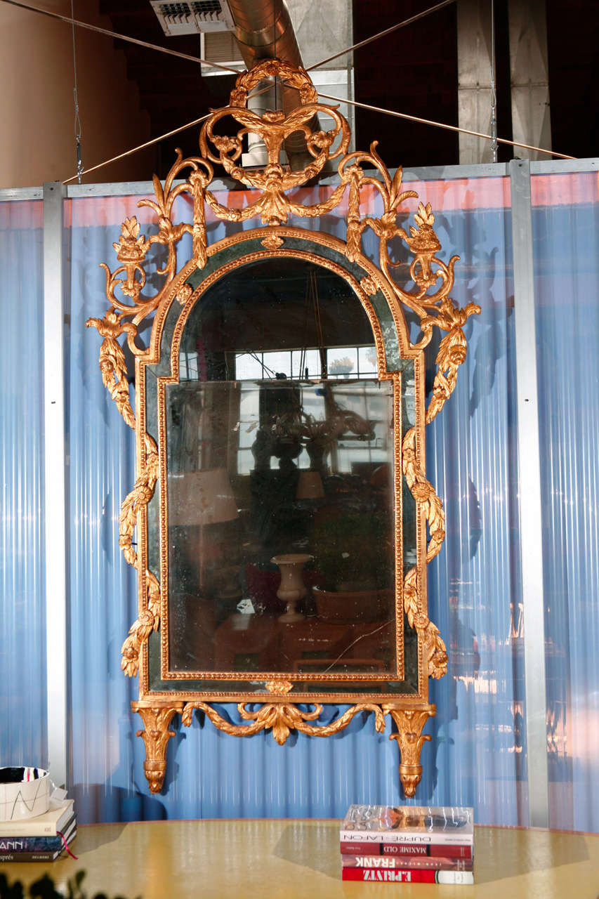 Carved Italian neoclassical giltwood mirror, 18th century.