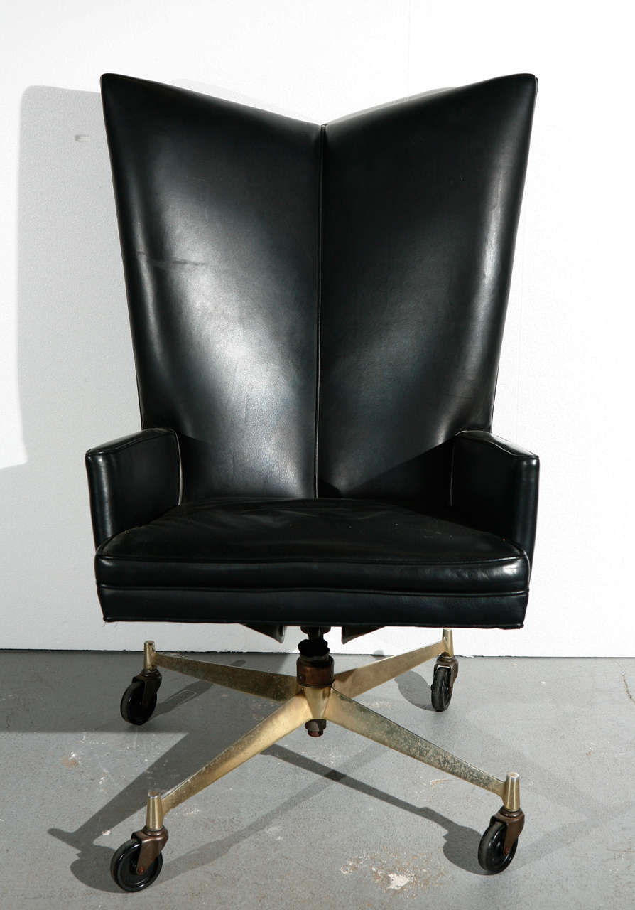 Paul McCobb black leather executive desk chair on casters