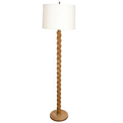 An Oak Floor Lamp in the Style of Jean-Michel Frank