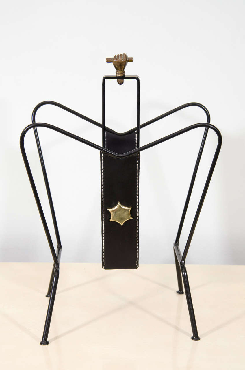 Wonderfully designed magazine holder by Jacques Adnet with leather and bronze details.