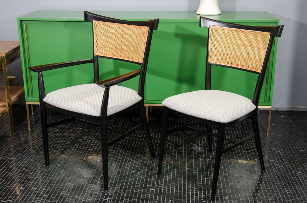 Wood Set of 6 black lacquer and cane Paul McCobb dining chairs.