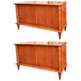 A Pair of Fruitwood Two Door Credenzas