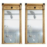 Pair of Regency Giltwood and Parcel-Ebonized Mirrors