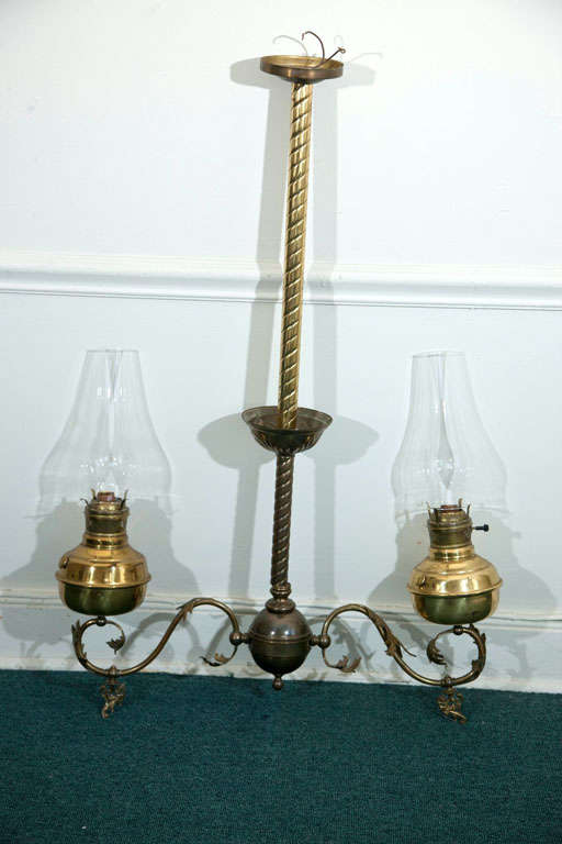 PAIR OF OIL LAMPS CONVERTED INTO DOUBLE CHANDELIER- USED OVER COUNTERS AND  LONG  TABLES