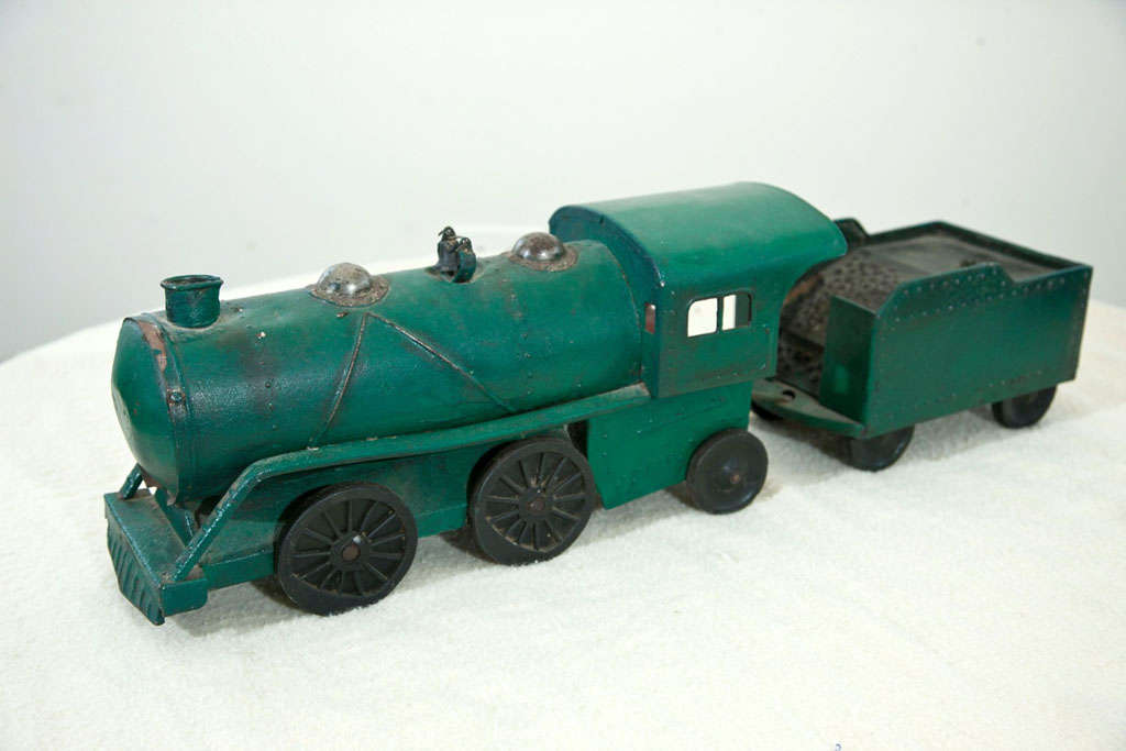 HAND MADE BY TYRUS BROWN IN 19TH CENTURY - TIN PLATE LOCOMOTIVE AND TENDER- ALL TIN PLATE WITH WOOD FLOOR FOR SUPPORT.  MADE IN NEW ENGLAND- PAINTED GREEN