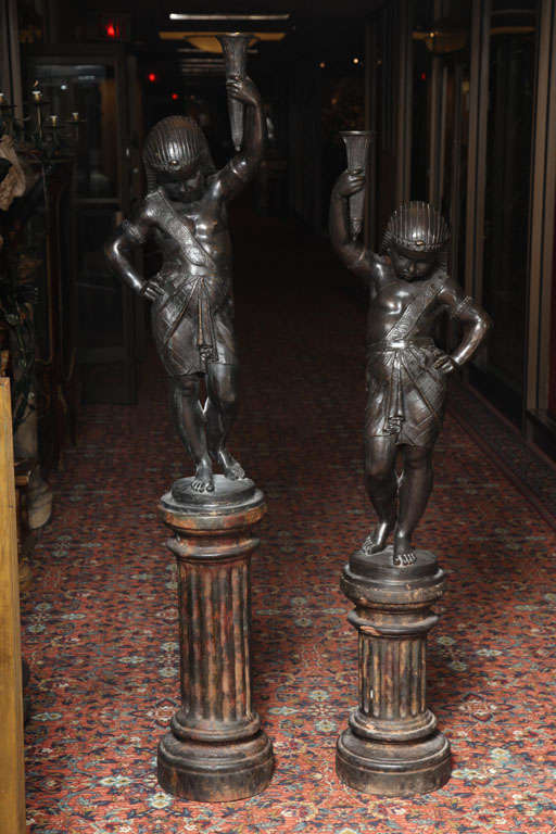 Pair of decorative Egyptian style bronze torchieres, 45