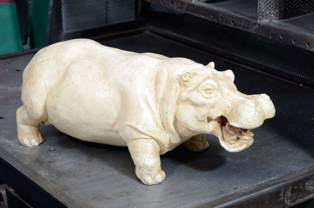 A wonderful tabletop sculpture of a hippo.