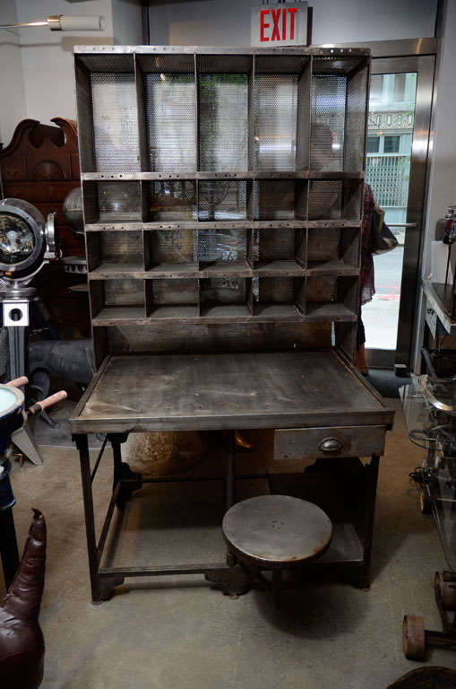 An incredible piece of industrial furniture, this mail sorter would be an amazing desk with space for objects and sculpture