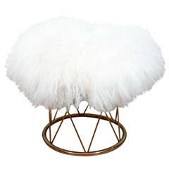 Fur covered brass stool