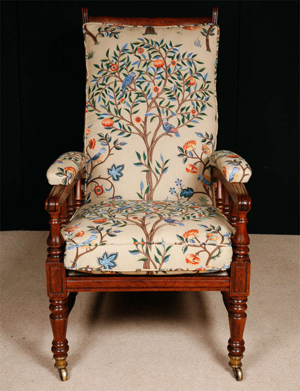 An Mahogany Arts and Crafts Armchair with adjustable back , known as the 