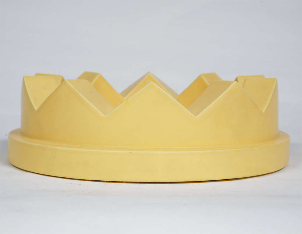 A Memphis Yellow ceramic fruit bowl by Ettore Sottsass.
With diagonal crenulations to the top.
Of Circular form.
Italian
Circa 1980