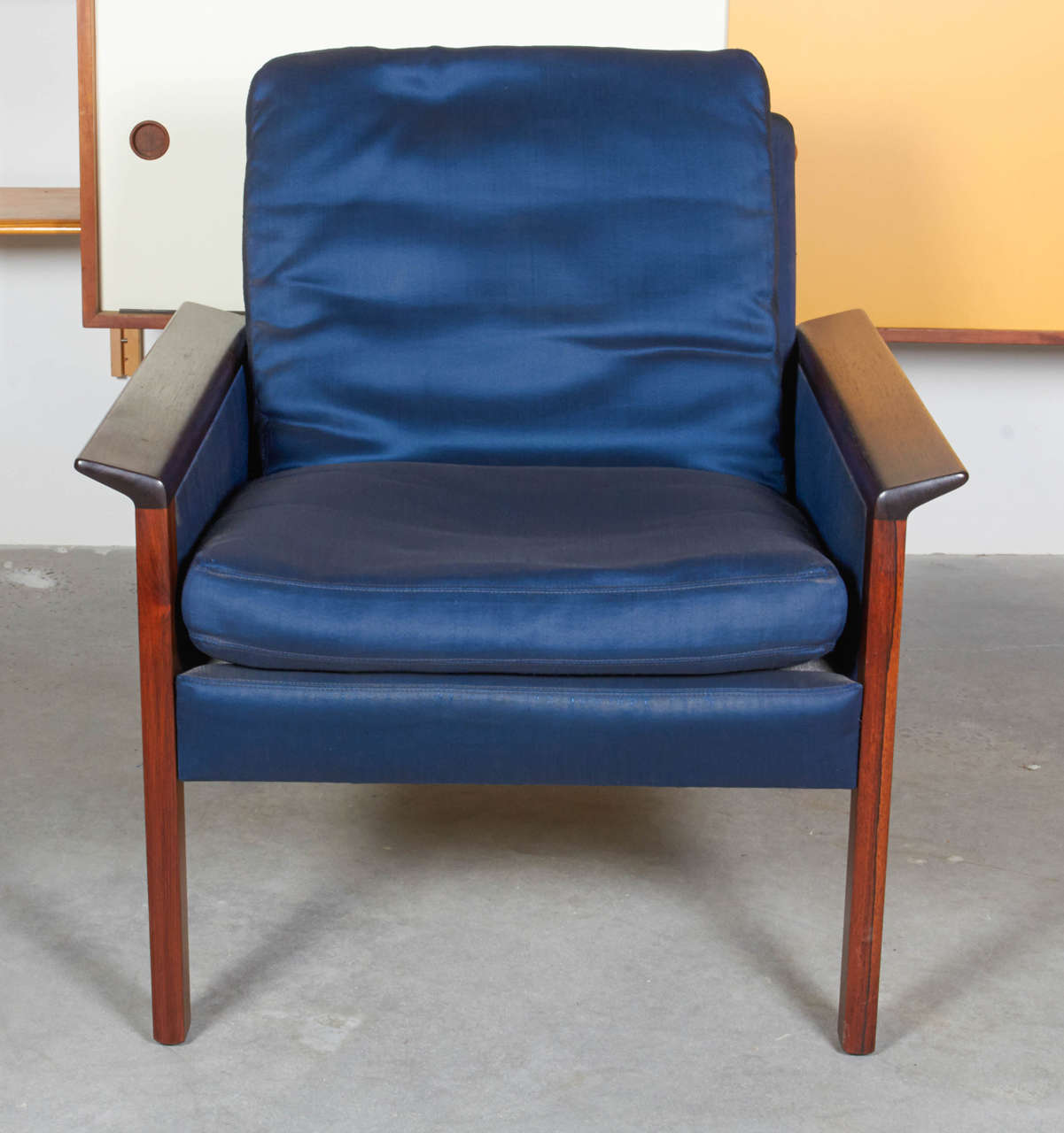 Vintage 1960s Upholstered Club Chair by Hans Olsen

This Rosewood Danish Arm Chair is in excellent condition. The raw silk fabric could use a dry-cleaning, but then I think you are good to go. We also can help you with reupholstery if you love the