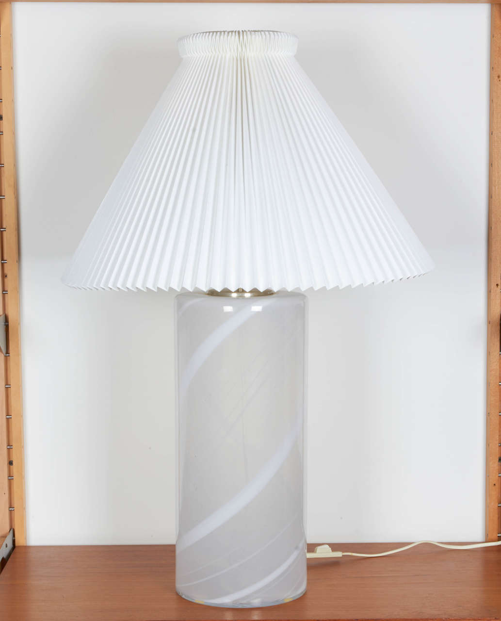 Vintage 1960s White Table Lamp

This mid century table lamp is in excellent condition. The shade is not original, but is by Le Klint. 75 watt max incandescent but more wattage if you use an LED bulb. Ready for pick up, delivery, or shipping anywhere