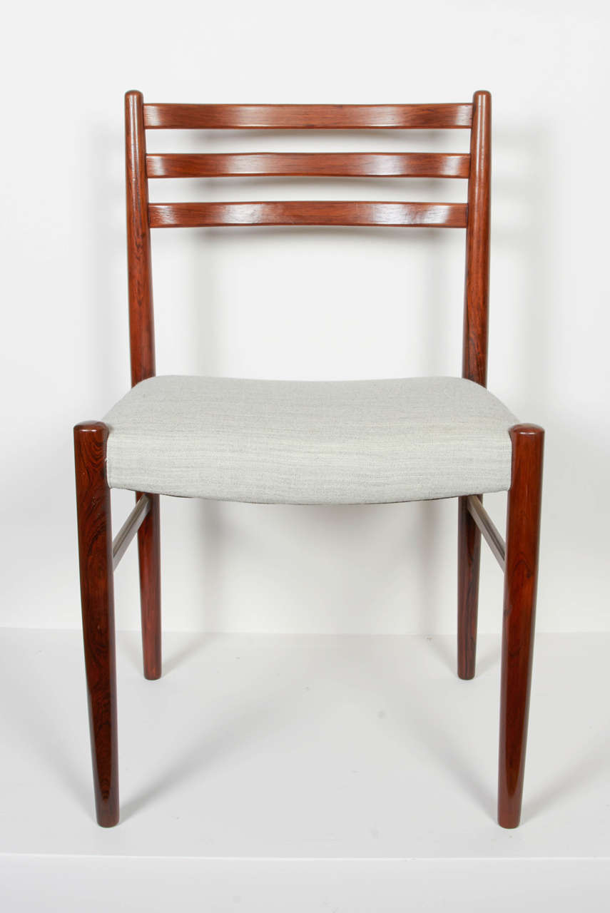Vintage 1960s Rosewood Ladder Back Dining Chairs

Nice large set of rosewood danish mid-century dining chairs.  Recently reconditioned and reupholstered in a light grey wool danish fabric.  If you'd like a smaller set, please enquire. Ready for