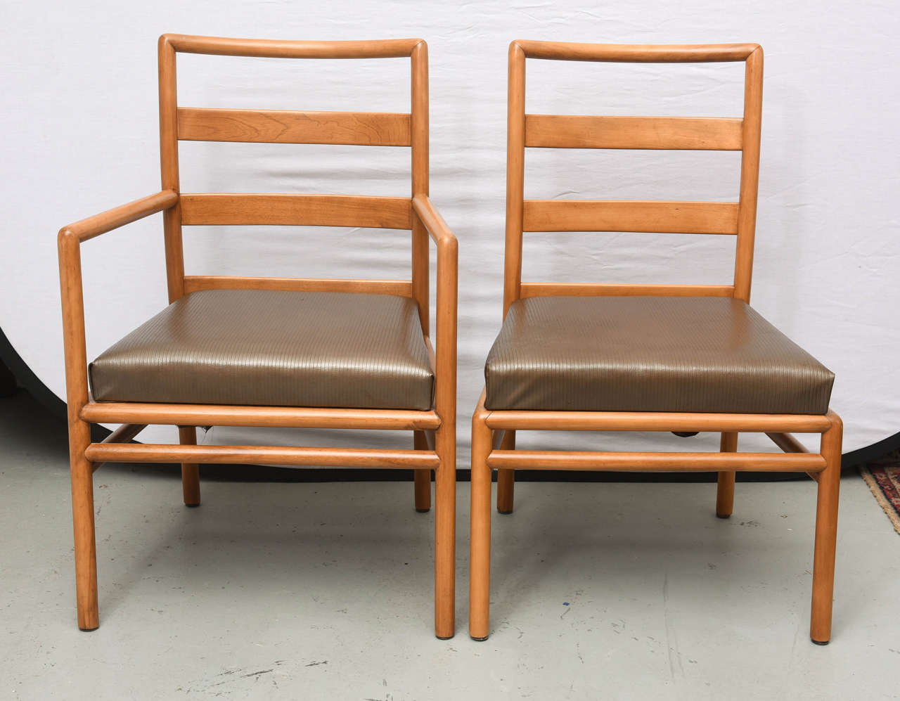 Gorgeous restored ladder back chairs by Robsjohn Gibbings for Widdicomb in Walnut. 2 arm chairs and 6 without arms.  1950s USA
