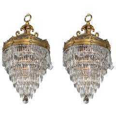 Antique Pair of Bronze and Crystal Drop Chandeliers