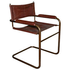 Set of Four Brass and Leather Cantilevered Chairs