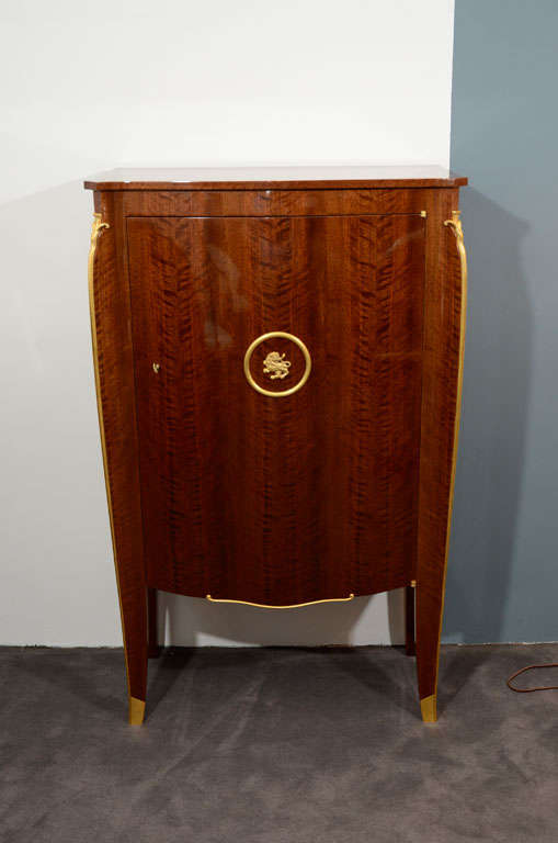 Single door walnut cabinet by Jules Leleu with a sycamore interior and gilt-bronze accents

Signed on ivory plaque and numbered: 22966

A similar cabinet is illustrated in House of Leleu by Francoise Siriex, Hudson Hill Press, 2008, p. 255