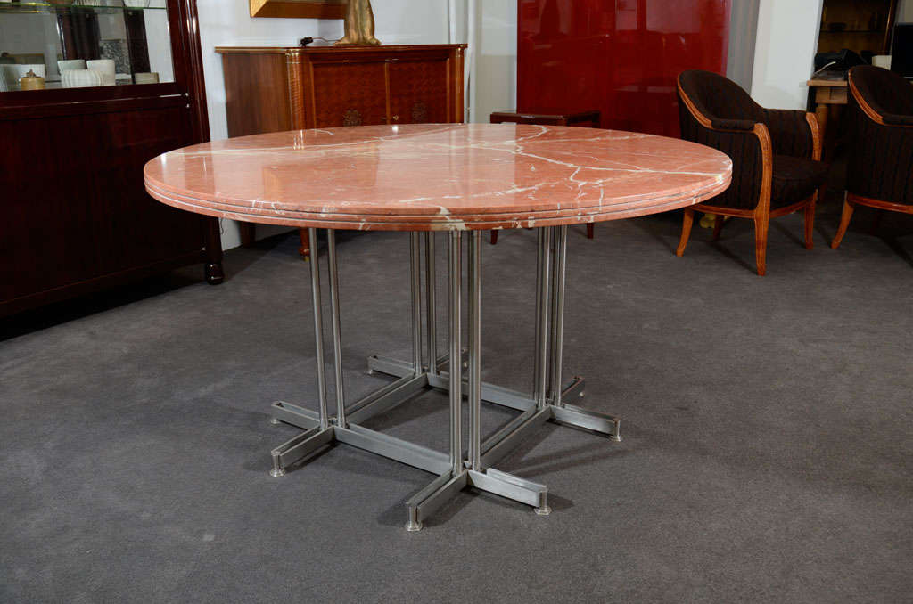 Unusual Round Marble Top Center Table.<br />
Stainless steel base by 'Roussel Inox' and original thick marble top.<br />
<br />
Provenance: This table was commissioned for the reception room of a Chateau which belonged to Mairie de Montpellier.