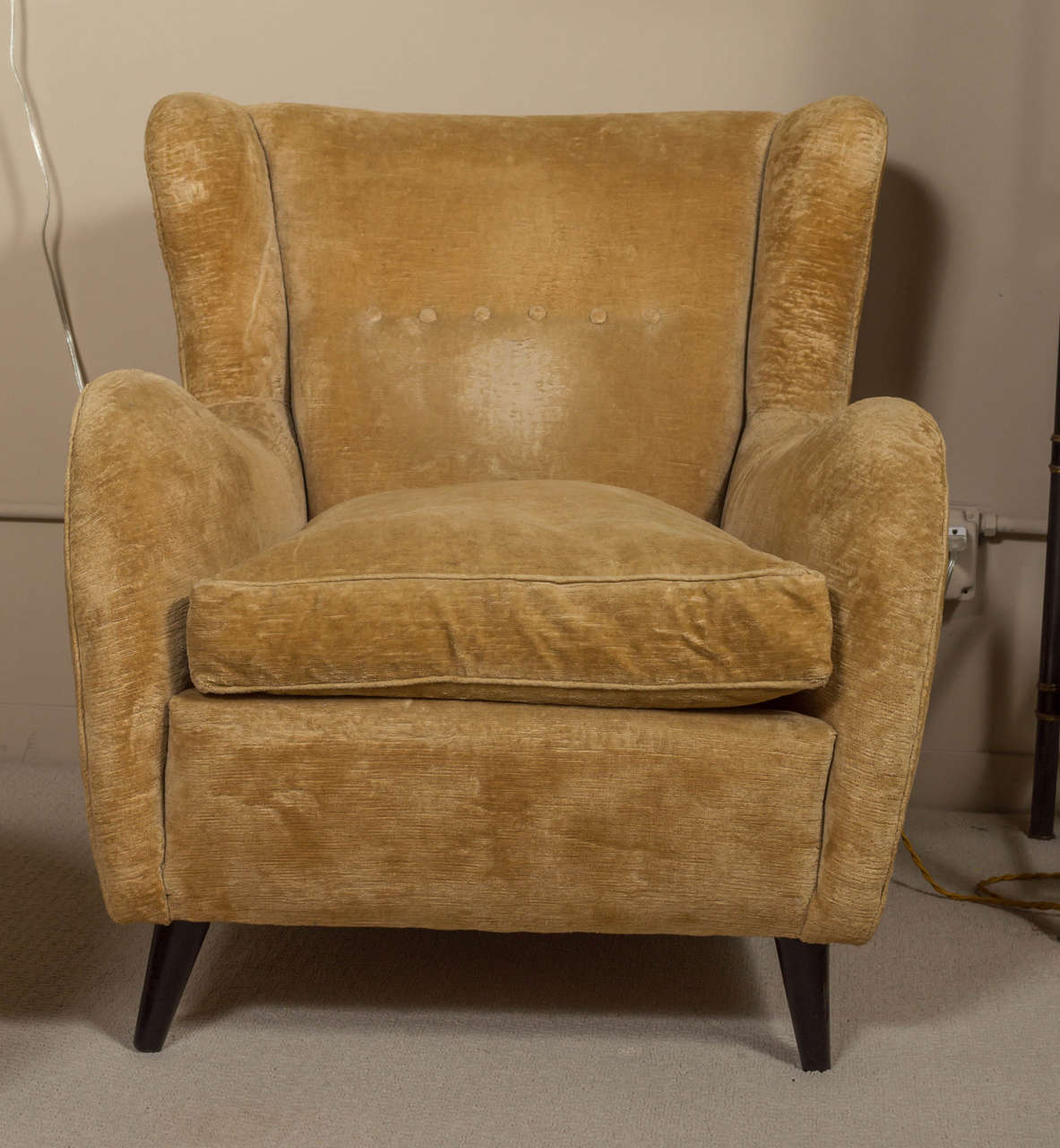 Stylish pair of Italian armchairs with ebonized wood legs and original fabric. circa 1950