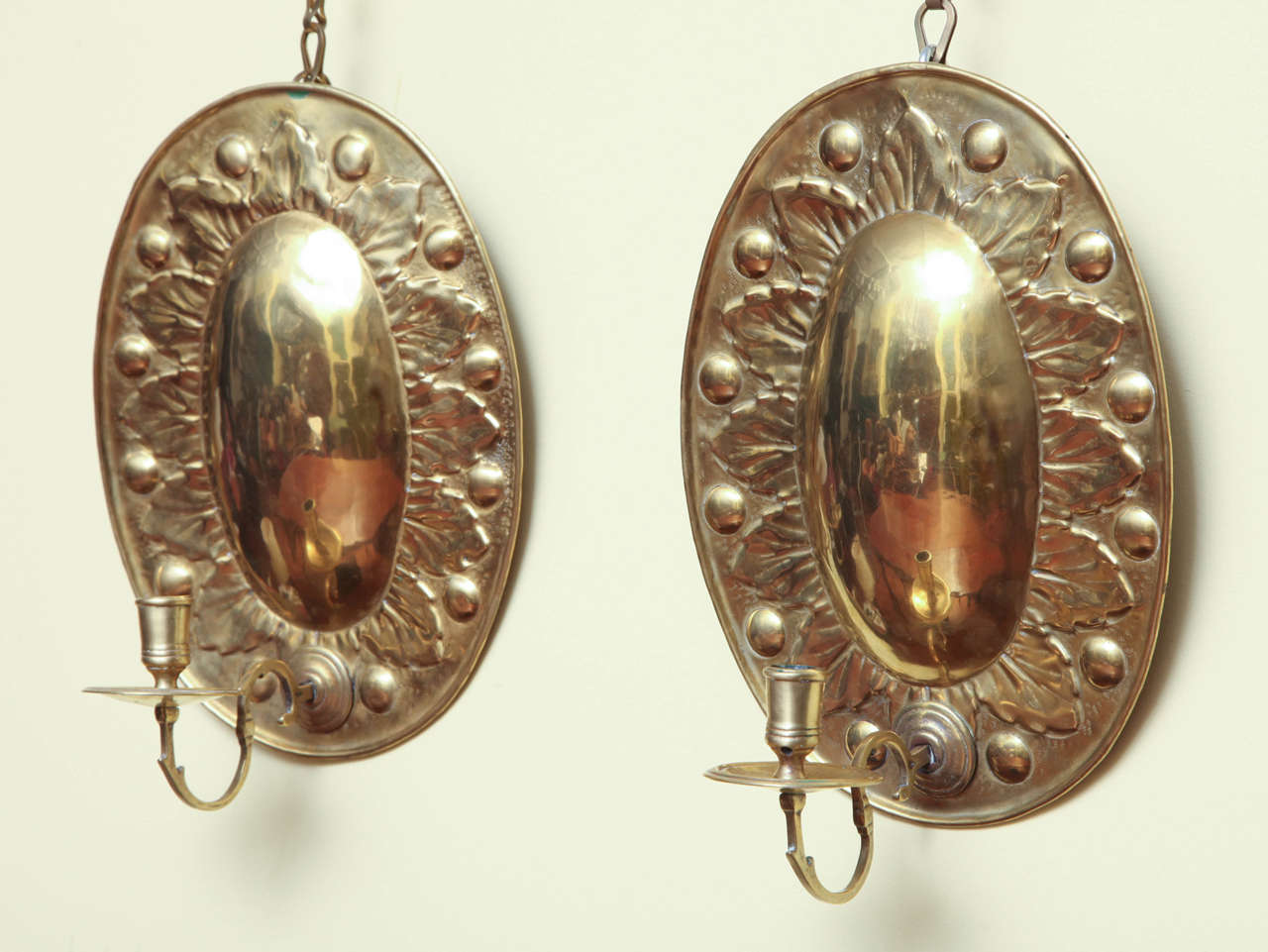Dutch Very Fine and Rare Pair of Antique Oval Repousse Brass Sconces, circa 1700