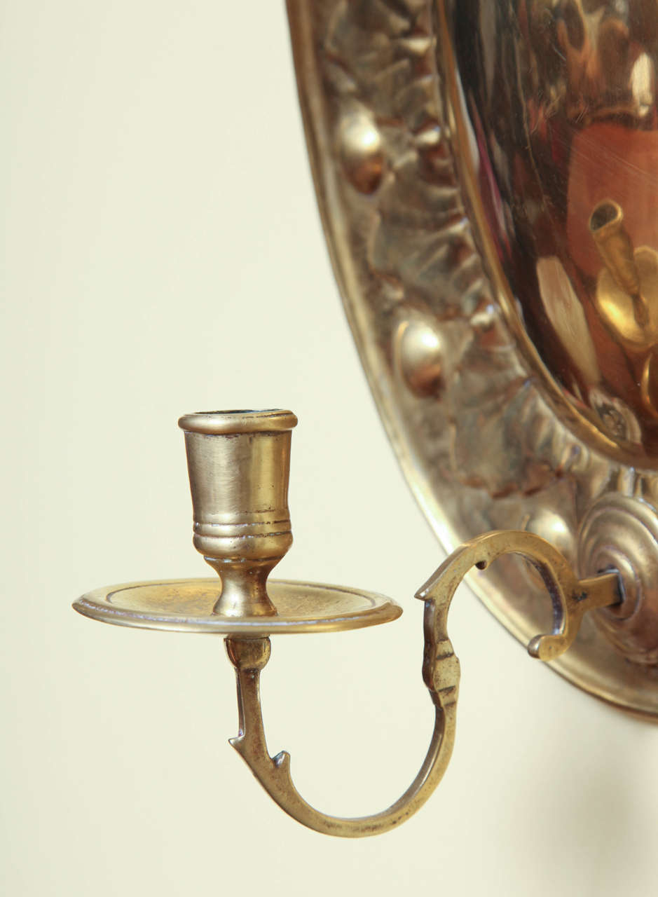 Very Fine and Rare Pair of Antique Oval Repousse Brass Sconces, circa 1700 In Excellent Condition In New York, NY
