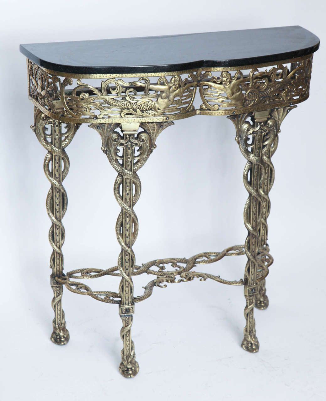 A1920s Art Deco patinated brass Console