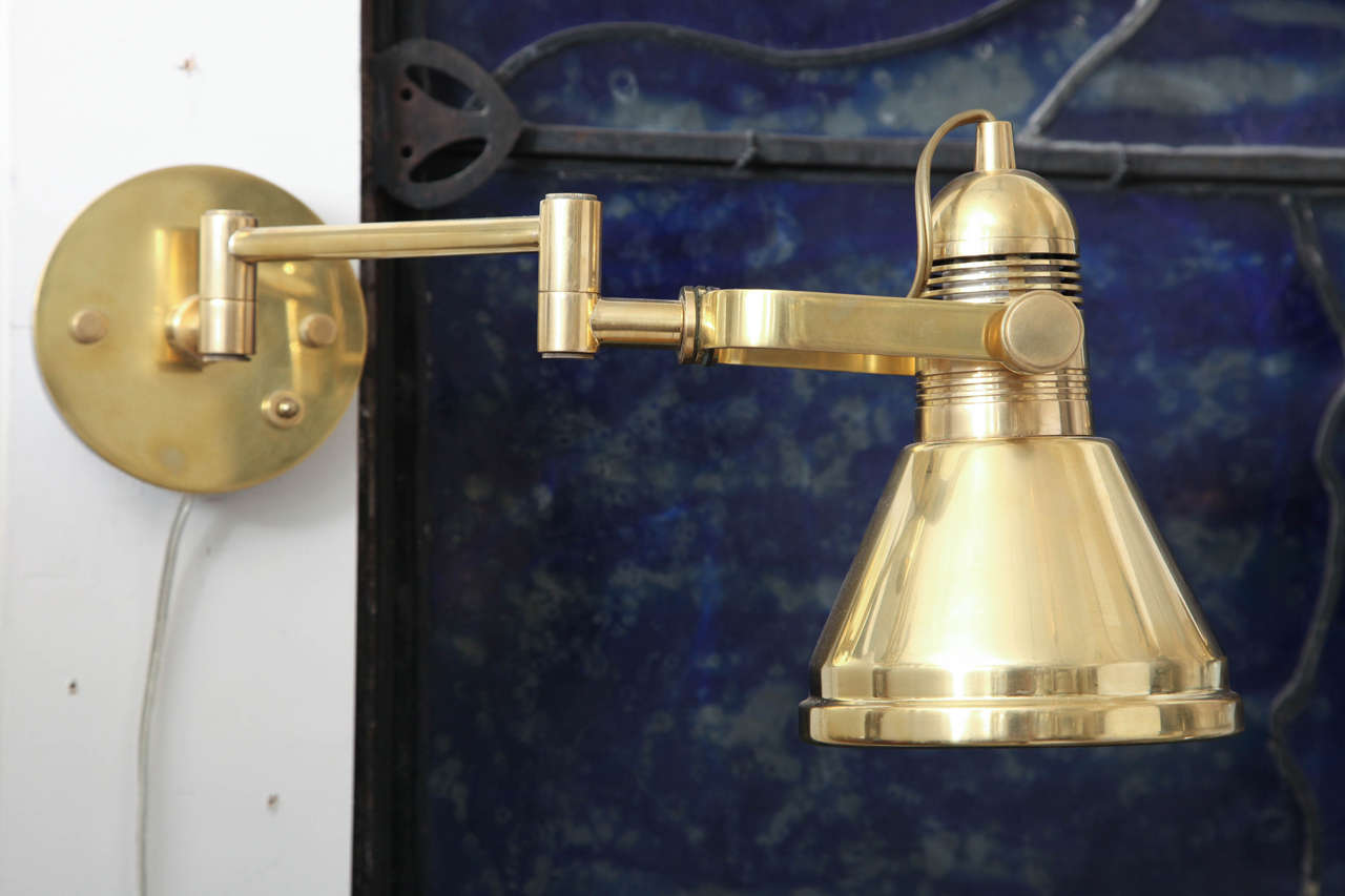 A pair of 1970s Articulated Wall Sconces by Nessen Studio