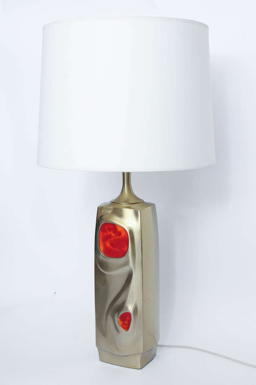 A pair of abstract sculptural table lamps, produced circa 1970s by Laurel Lamp Company, crafted of polished nickel.