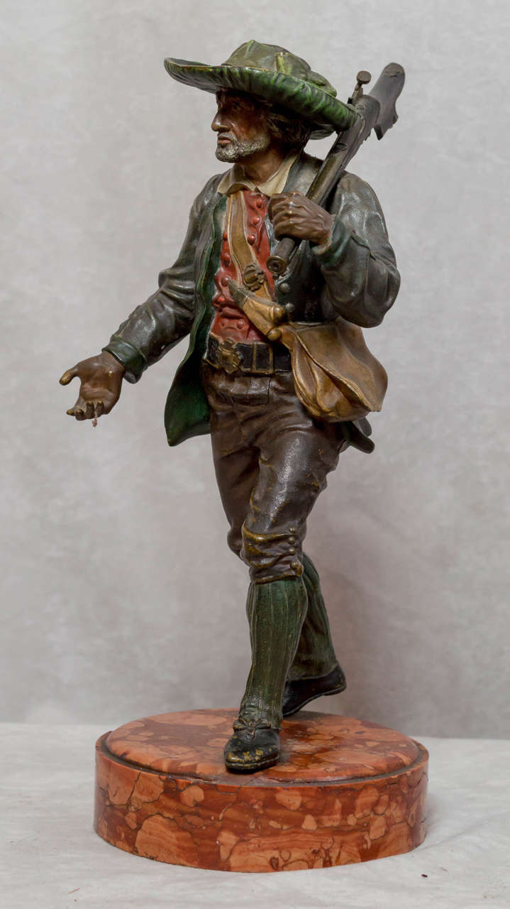 This incredibly detailed casting of a 18th century hunter is a fine an example of a Vienna bronze. This is a large and substantial figure. Not the usual miniature examples. Look at the gentleman's face and hands to note this exceptionally cast
