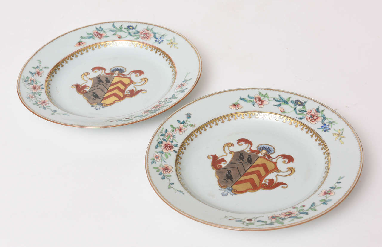 Featuring a Welsh coat of arms emblazoned with three ravens and three chevrons; the rims decorated with peony sprays.

Provenance: Chinese Porcelain Company, New York, NY.