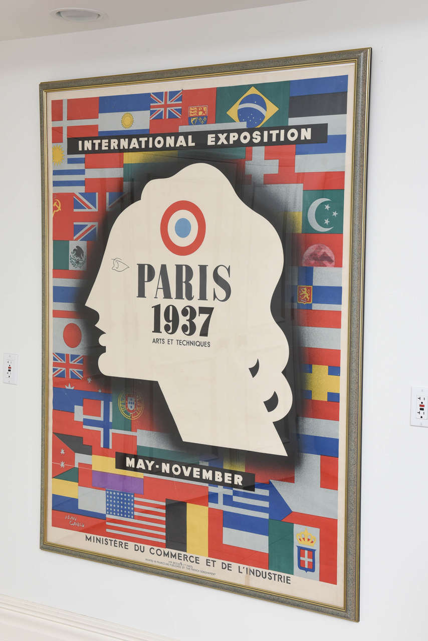 Rare large version of the 1937 exhibition poster designed by acclaimed Art Deco designer Jean Carlu and printed by Bedors & Cie, Paris. Condition: B+, some creasing and restoration. Dimensions are unframed.