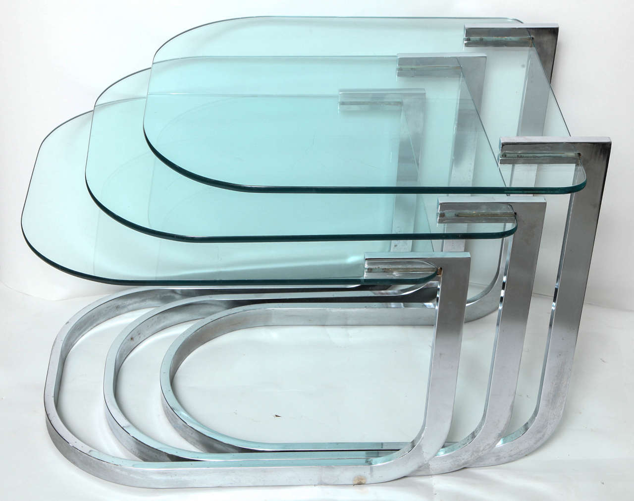Three Modernist Nickel-Plate and Glass DIA Nesting Tables