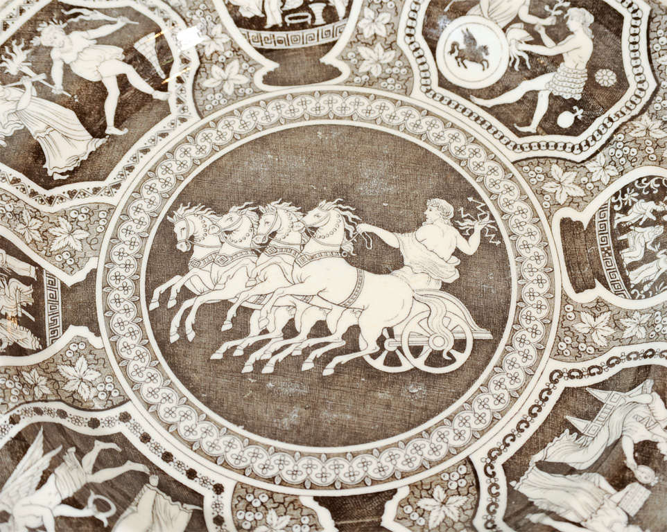 Based on ancient Greek and Roman art Spode's Zeus in His Chariot pattern is Transferware. Making it involved transferring an image from a copper engraving onto paper, and then from the paper onto the pearlware plate. According to 