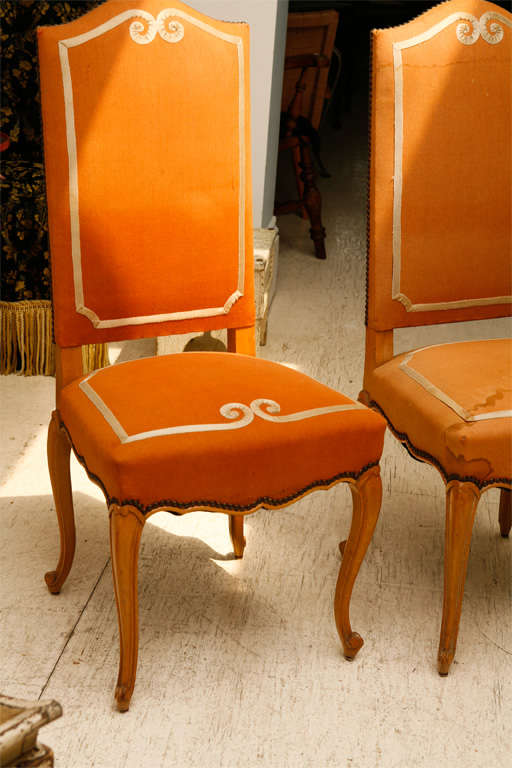 Pair of wonderfully upholstered Continental side chairs.  Nicelyy carved cabiolet legs.