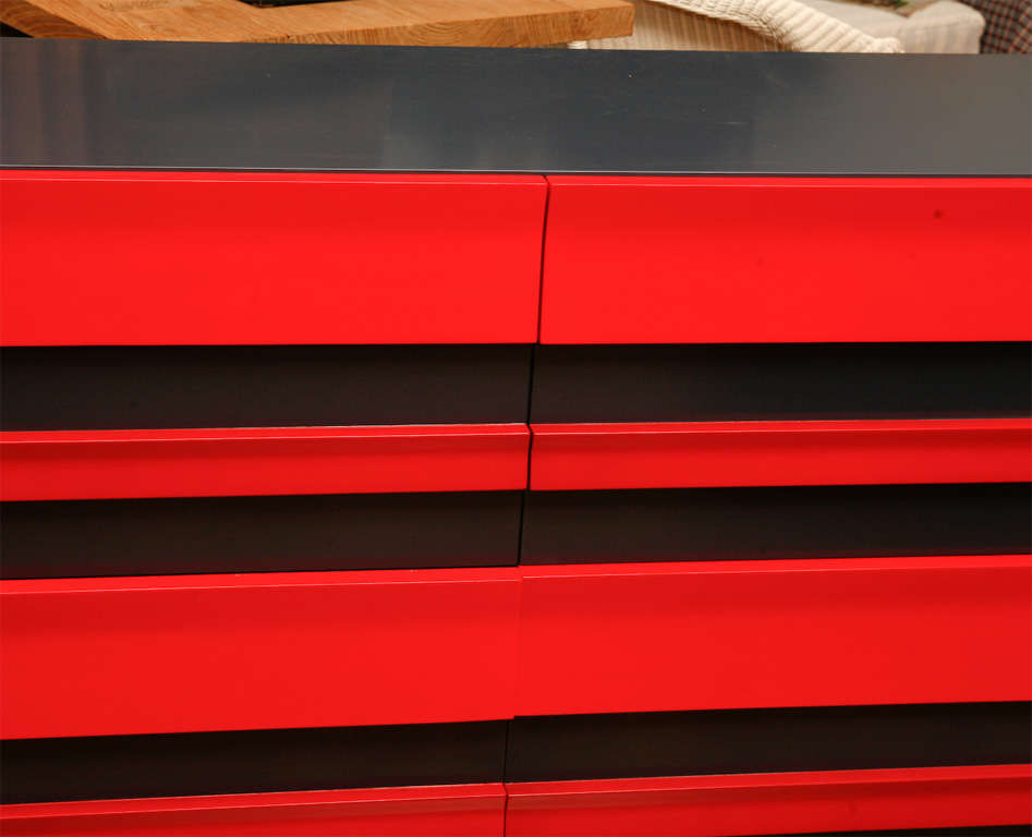 Eight drawer dresser lacquered navy with red striped drawer fronts