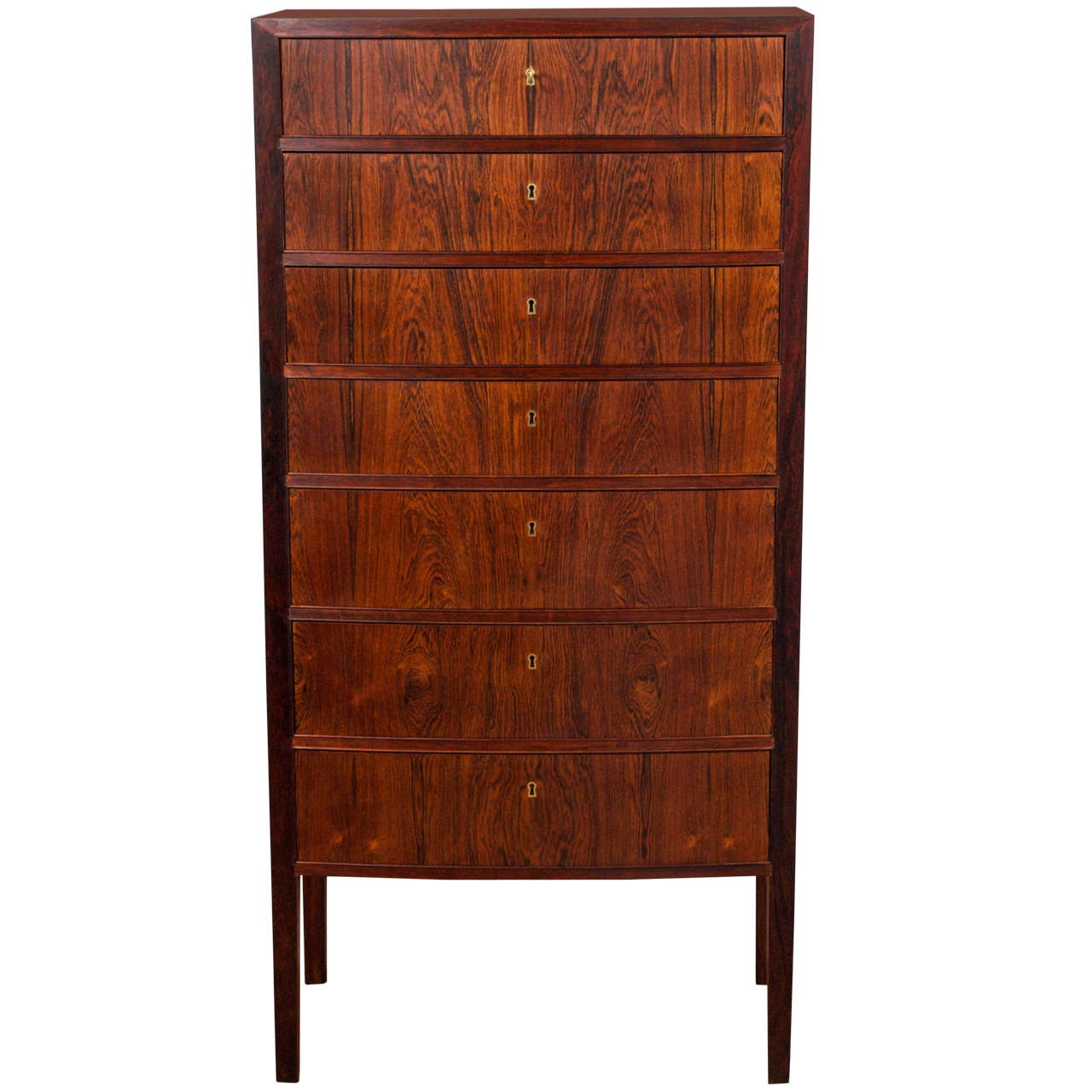 Ole Wanscher- 'Lingerie Chest'
A Rosewood chest of drawers with slightly curved front and seven drawers with individual locks. Key included. Manufactured for retailer Illums Bolighus with paper label.
Denmark, circa 1957.
 